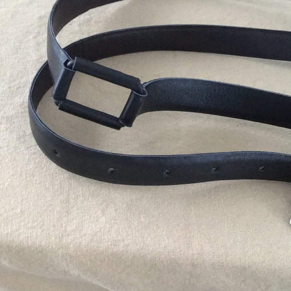 Black leather belt-wraps twice